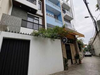 Âu cơ ngay vòng xoay lê đại hành 4 tầng 17  ô tô đổ cửa cách 30m mặt tiền 5 tầng rộng thoáng.