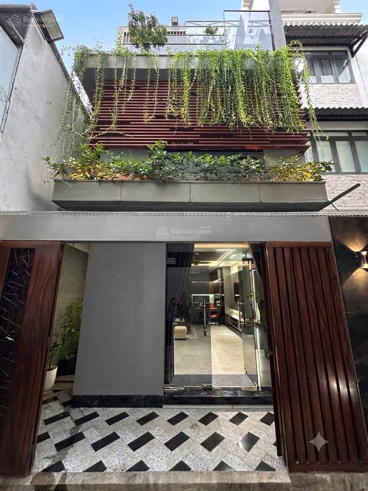 3 tháng 2 trung tâm quận 10  đối diện nhà hát hoà bình  4 tầng hiện đại 68m2