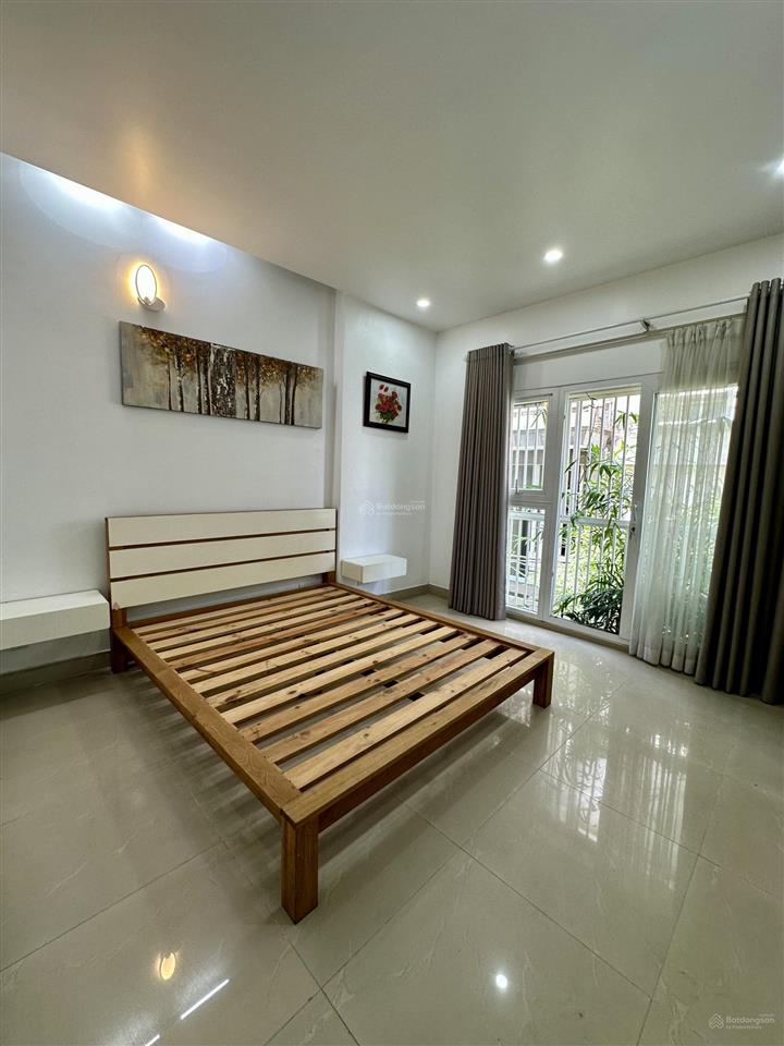 Quận 10 cách mạng tháng 8  4,2 x 14 ô tô đổ cửa 4pn  4 tầng bề thế đẹp .