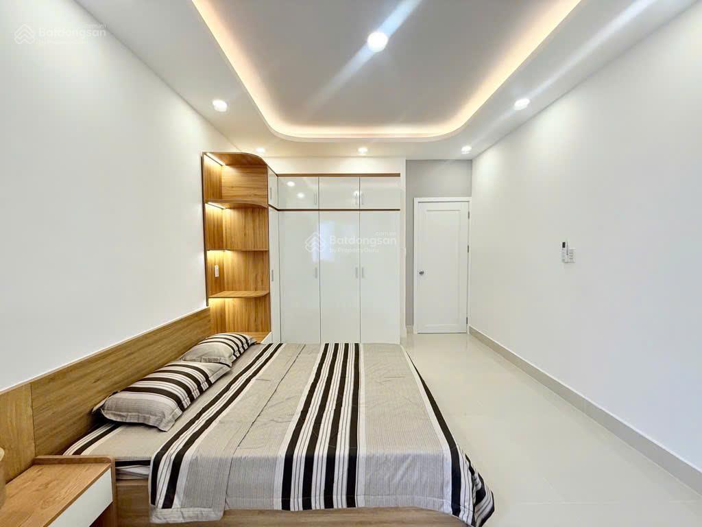 Bán chdv hẻm 8m nơ trang long  p12, (5x18m) 6 tầng 15pn có pccc, nhà mới 80tr/th