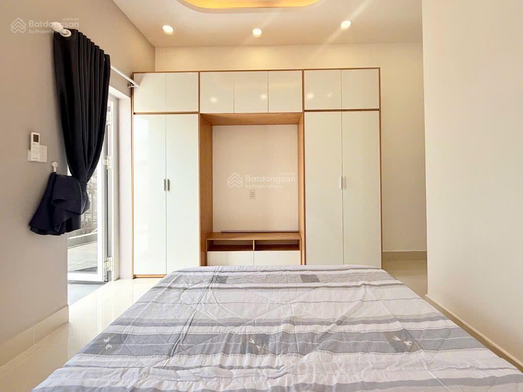 Bán chdv hẻm 8m nơ trang long  p12, (5x18m) 6 tầng 15pn có pccc, nhà mới 80tr/th