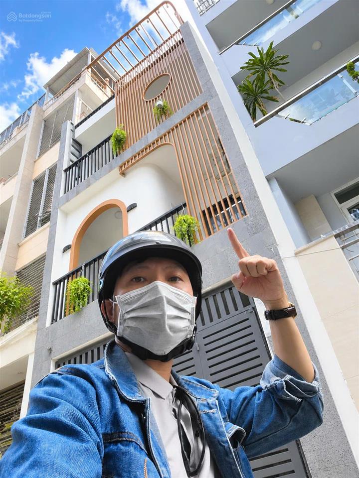 Nhà 3 lầu mới đẹp ở ngay, hẻm 4m ôtô đậu cửa, ngay bến xe miền đông