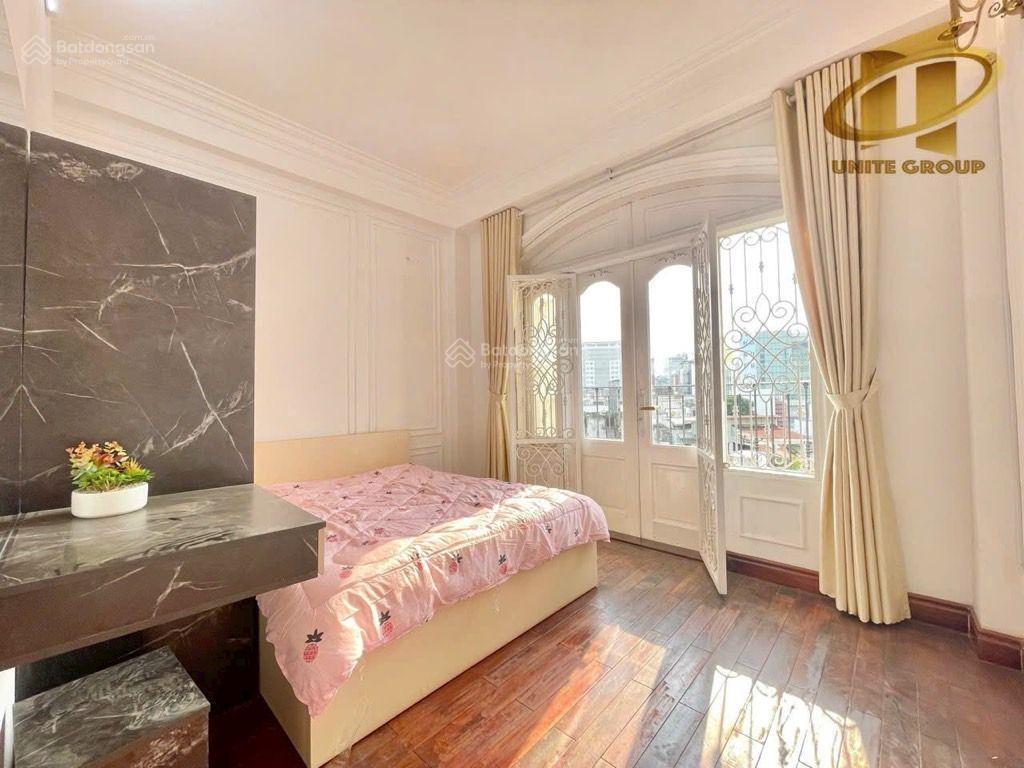 Giảm 2 tỷ bán gấp nhà mặt tiền 8 tầng trần huy liệu phú nhuận, có thang máy, dòng tiền tốt 21 tỷ