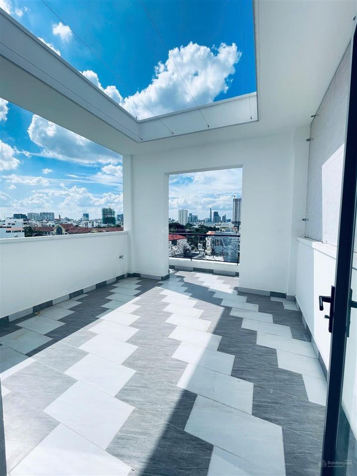Nhà khu vip đường số 12m  quận 7 6 tầng  7 phòng thang máy gara ô tô nhà thông minh