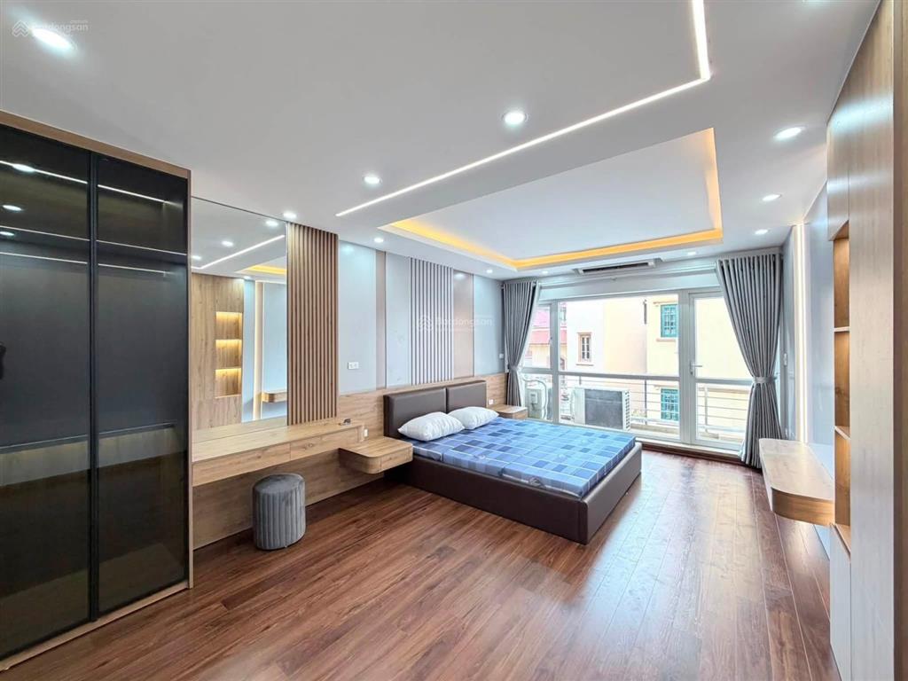 Nhà trung tâm ba đình ô tô đỗ cửa  50m2  7 tầng thang máy  giá 18.8 tỷ