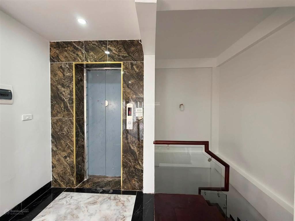 Nhà trung tâm ba đình ô tô đỗ cửa  50m2  7 tầng thang máy  giá 18.8 tỷ