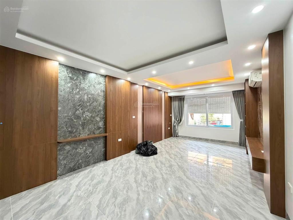 Nhà trung tâm ba đình ô tô đỗ cửa  50m2  7 tầng thang máy  giá 18.8 tỷ