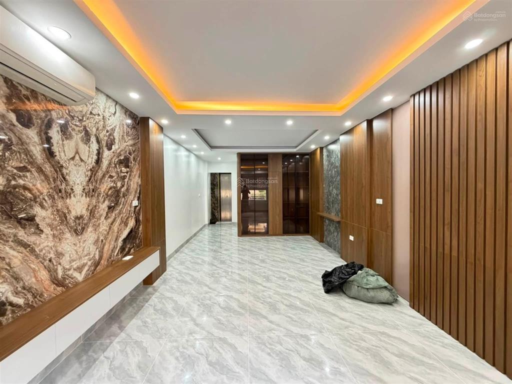 Nhà trung tâm ba đình ô tô đỗ cửa  50m2  7 tầng thang máy  giá 18.8 tỷ
