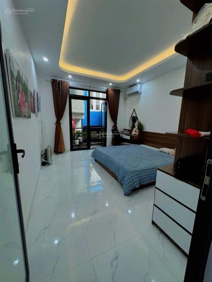 Nhà 5 tầng võ thị sáu 30m ô tô sát nhà sổ nở hậu