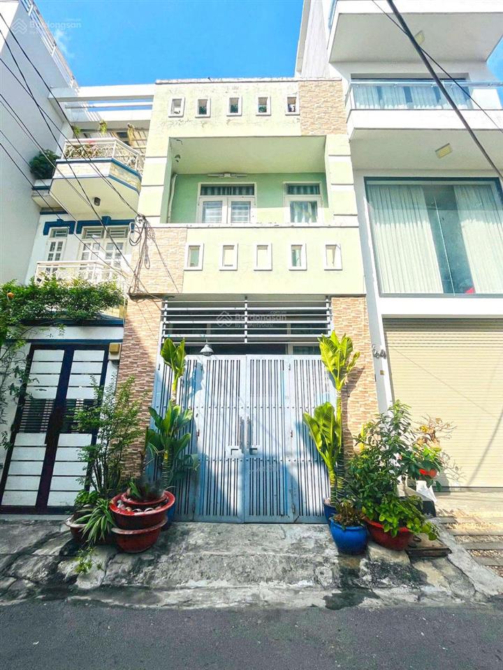 Bán gấp nhà 2 tầng hẻm xe hơi 8m lý phục man quận 7