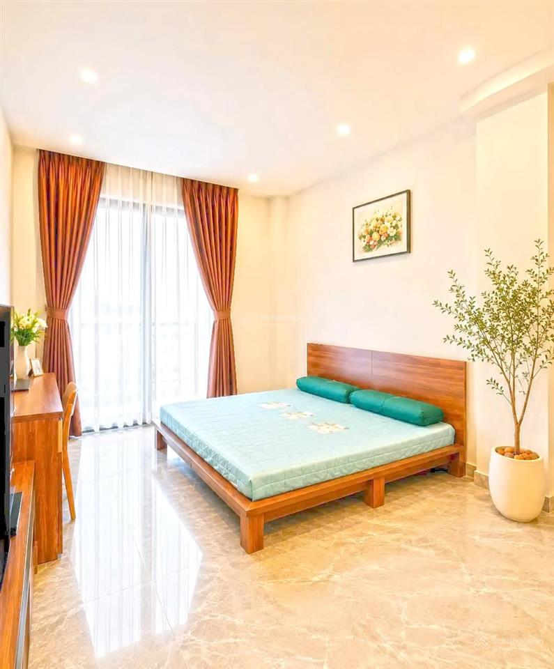 Hàng hiếm  nhà đẹp 2 lầu st ôtô đậu trong nhà đường 8m khu kiều đàm, q7