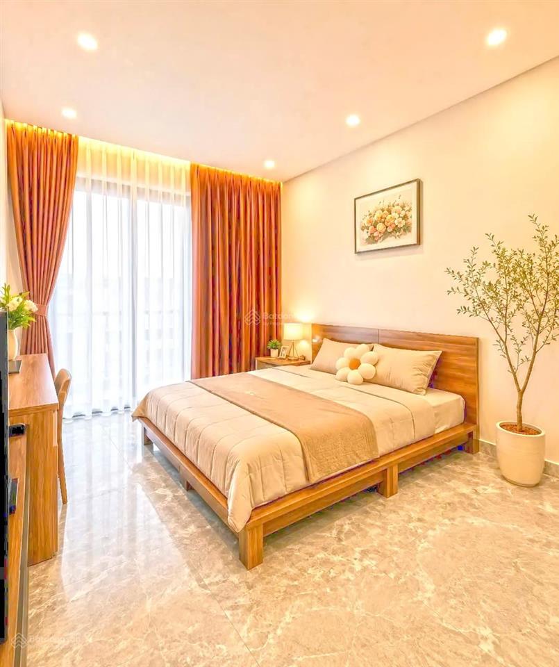 Hàng hiếm  nhà đẹp 2 lầu st ôtô đậu trong nhà đường 8m khu kiều đàm, q7