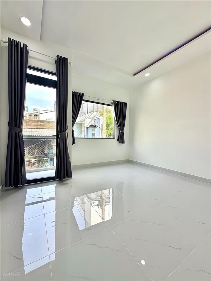 Bán nhà đường lê văn quới, giá 3,85 tỷ,dt 32m2, 2pn, 2wc, hẻm thông ,sổ hồng riêng