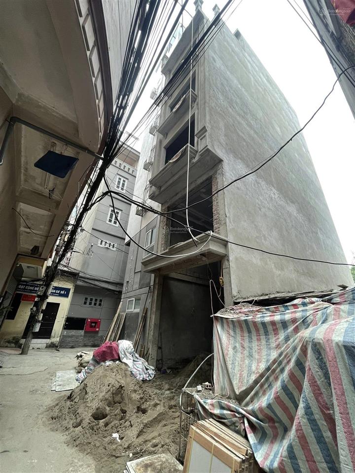 Bán nhà xây mới chùa láng, ô tô vào, 7 tầng, thang máy, 46m2, 19.5 tỷ