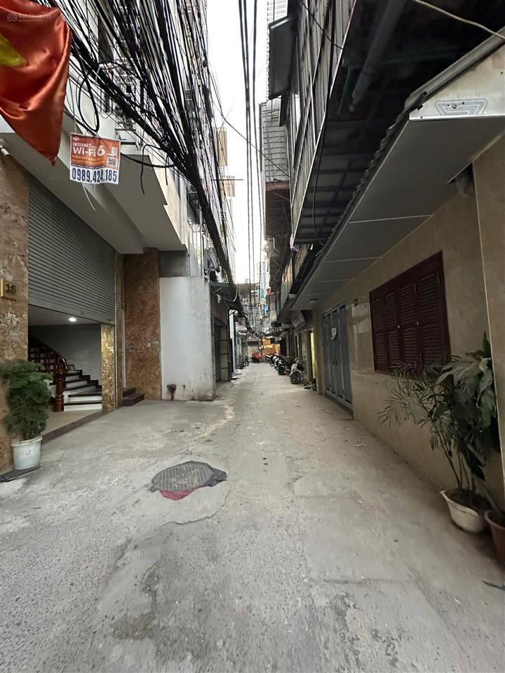 Bán nhà xây mới chùa láng, ô tô vào, 7 tầng, thang máy, 46m2, 19.5 tỷ