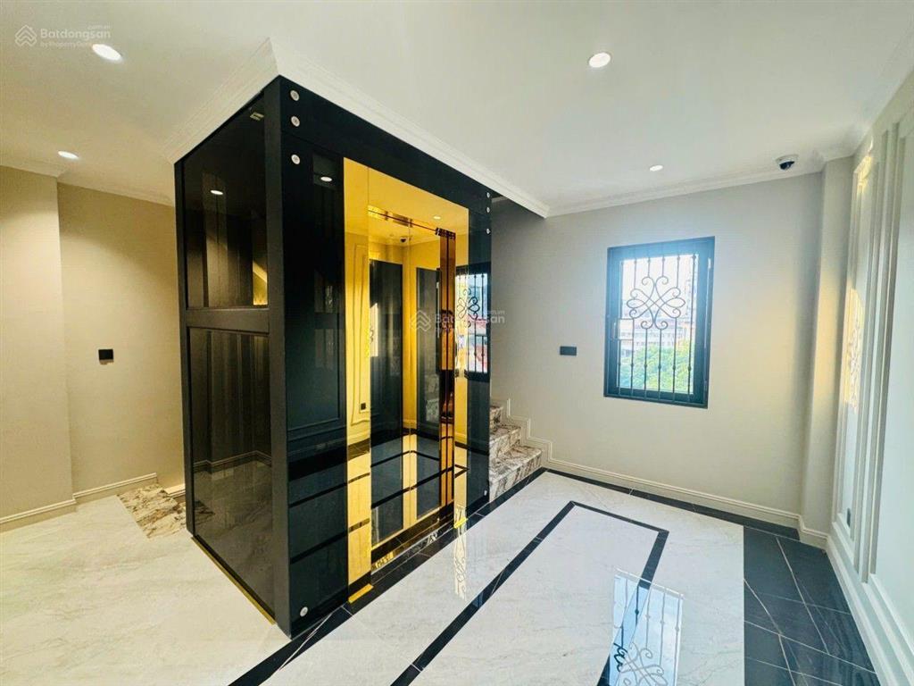 Bán nhà phường vĩnh hưng. dt,66m x 6 tầng thang máy. ngõ thông ô tô. gần mặt phố. giá, 15 tỷ