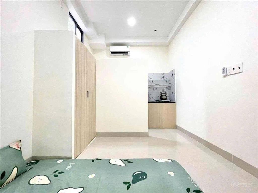 Gấp bán  chdv 13 phòng full nt  4 tầng (4 x 20m) hẻm oto, dòng tiền 70tr/th. ngay học viện cán bộ