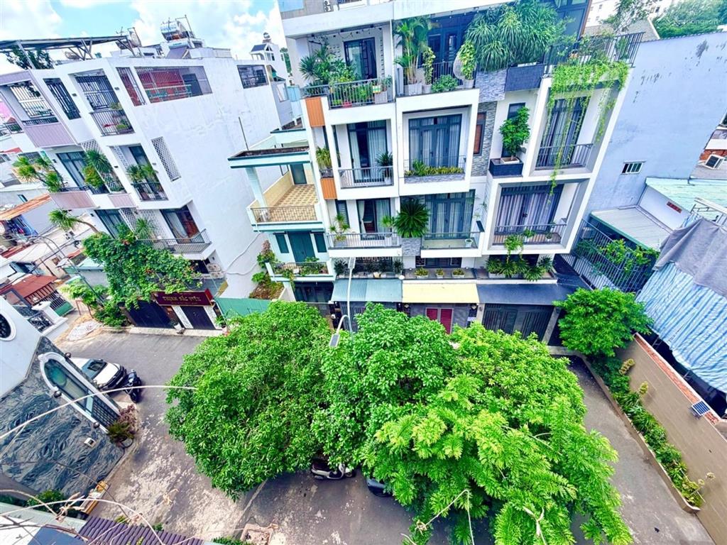 Khu nhà đẹp đường 12m  1/ sát mặt tiền quang trung, 4 tầng (4.1 x 16)  oto vào nhà