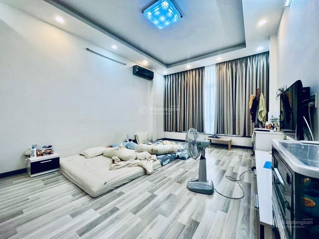 Bán nhà ngang 4m x 16m phường 2 tân bình ô tô đậu cửa