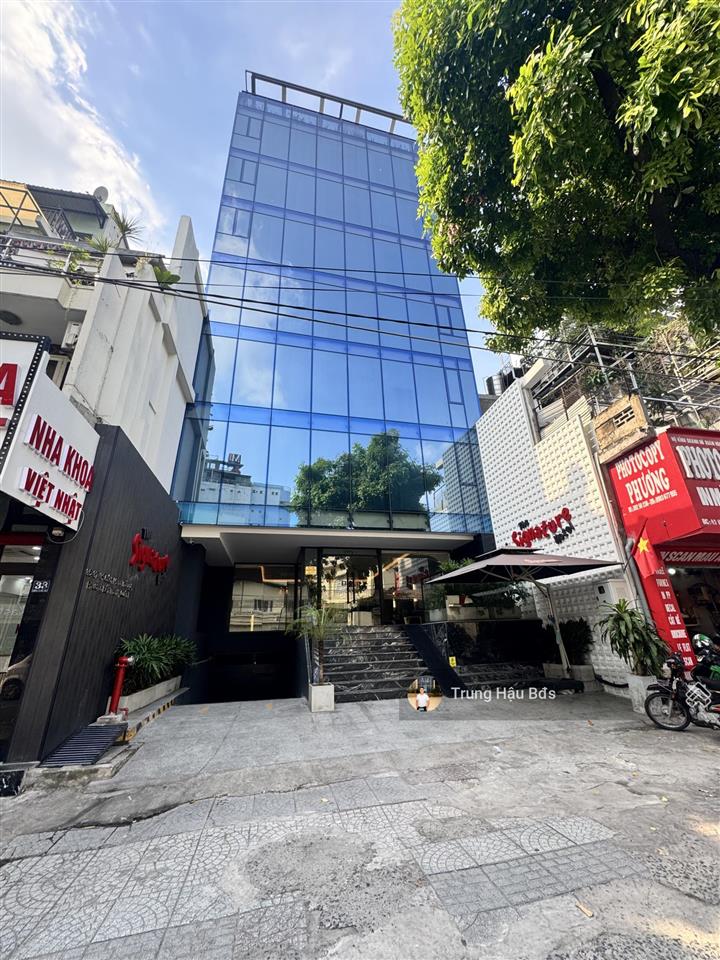 Tòa nhà mt hồ văn huê pn  dt 10 x 22m  nở hậu 22m  2 hầm  10 tầng  giá 85 tỷ