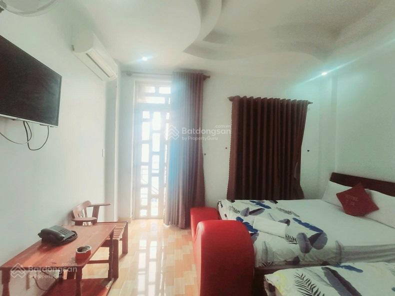 Bán ks nhà mt ngộp nặng trần thị cờ, thới an, q12, 96m2, 5 tầng, thang máy, 14 phòng