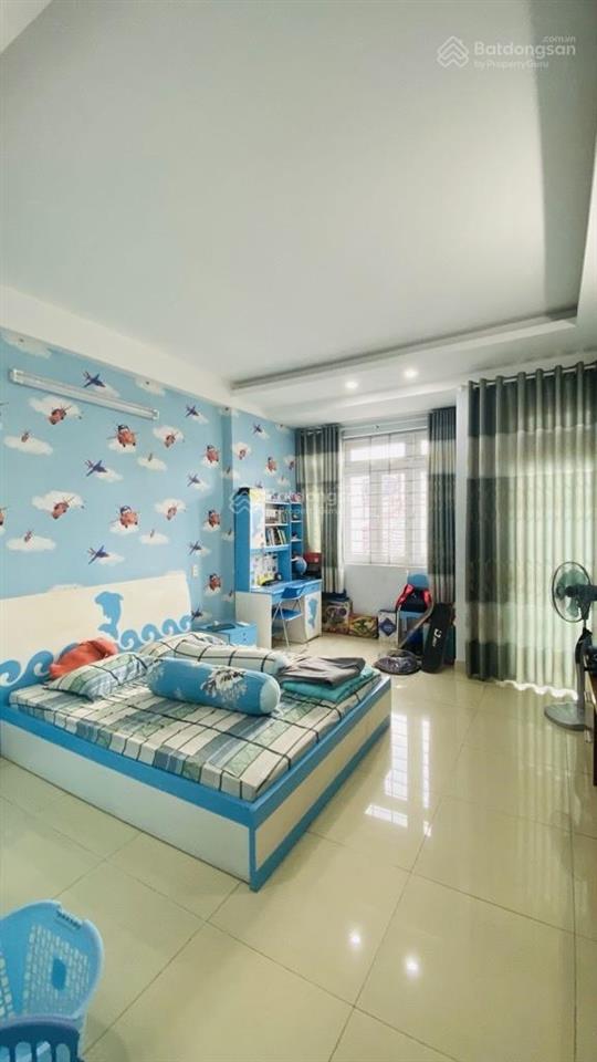 Nhà quang trung 4 tầng 4pn  dt 86m2  hxh  ngay chợ hạnh thông tây chỉ 9.6tỷ