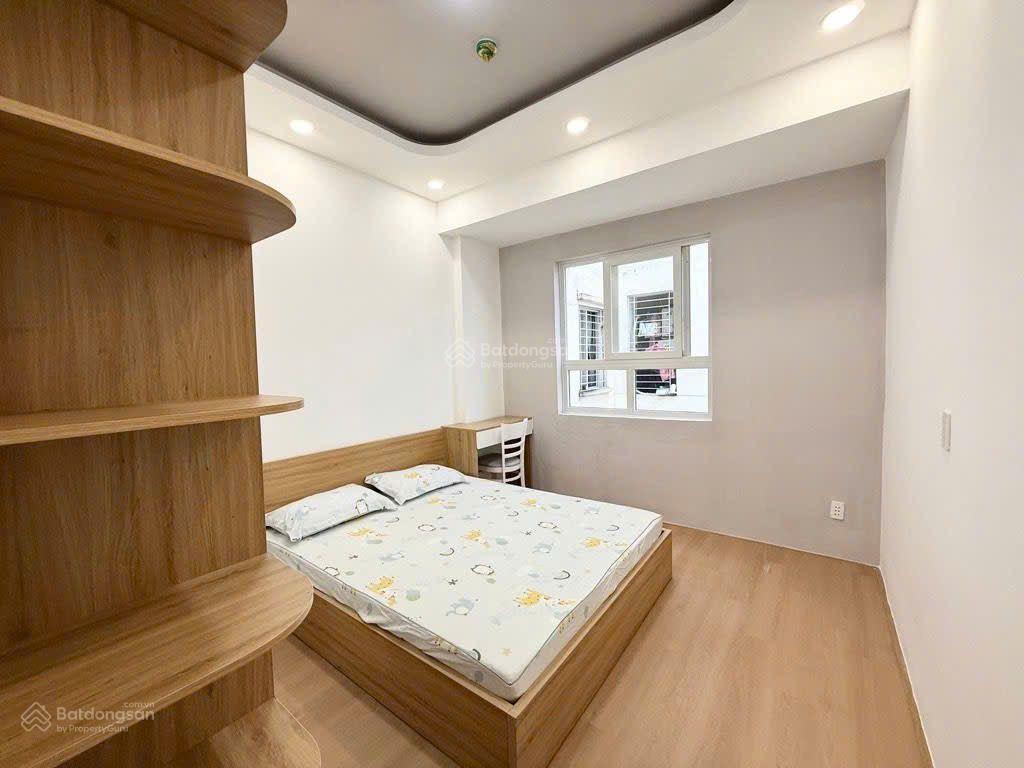 Bán căn hộ 2pn có sổ hồng đầy đủ nội thất chung cư cao ốc b ngô gia tự phường 2 quận 10