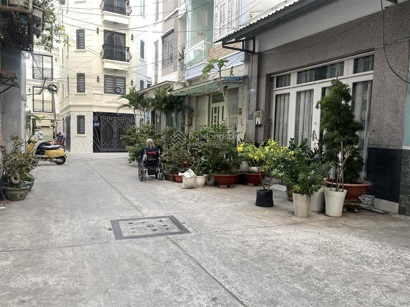 Xe hơi đỗ cửa nhà đẹp 6 tầng sát mặt tiề phan xích long 50m2 ngang 5m , kinh doanh được  9,3 tỉ tl