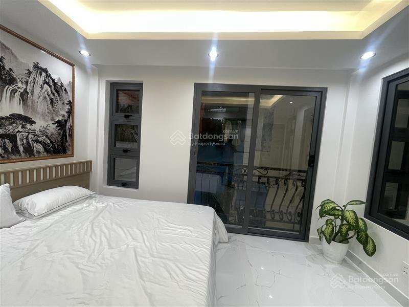 Xe hơi đỗ cửa nhà đẹp 6 tầng sát mặt tiề phan xích long 50m2 ngang 5m , kinh doanh được  9,3 tỉ tl