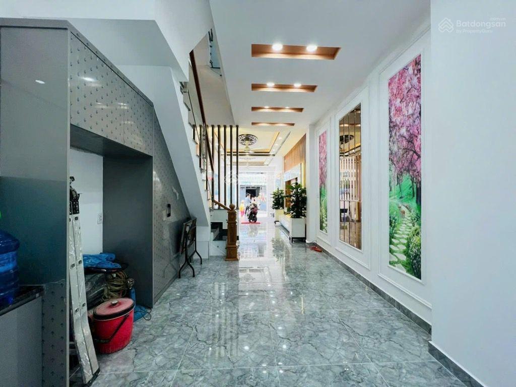 Bán nhà mặt tiền 84m2  4 tầng  6pn  đường tth9  p.tân thới hiệp  quận 12