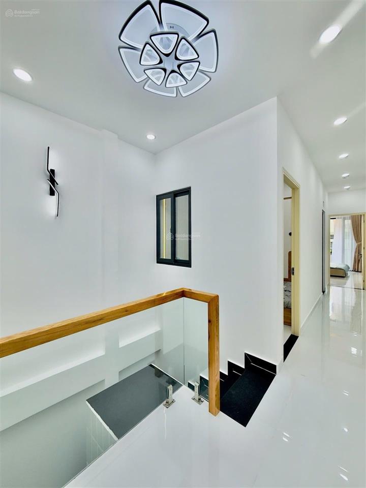 Bán nhà mới vạn kiếp  phan xích long  1/ sát mặt tiền  hẻm xe hơi  gần 70m2 chỉ 8,59ty