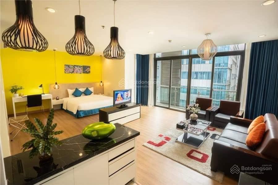 Bán gấp khách sạn phố duy tân  850m2 x 15 tầng  mặt tiền 18m  doanh thu 24 tỷ/năm