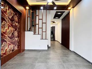 Mặt tiền 12m trần thủ độ  nhà mới 100% 4pn, 3wc, vị trí đẹp xe hơi vào nhà.