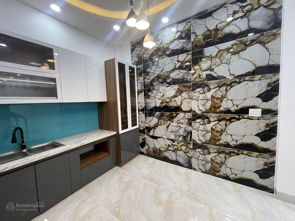 Nguyễn văn đậu  bình thạnh  41m2  4 tầng xây mới  hẻm xe hơi