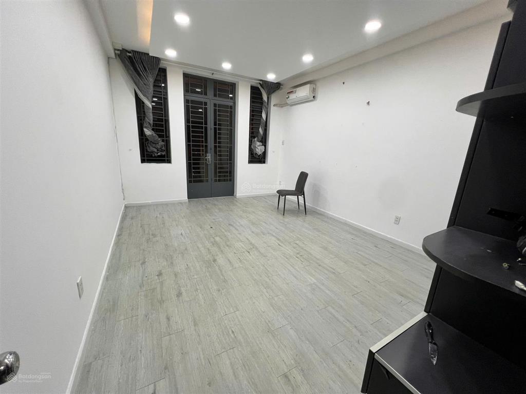 Giảm 499 triệu bán nhanh nhà 1 trệt, 3 lầu  hẻm xe hơi đường đào duy anh