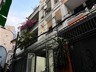 Giảm 499 triệu bán nhanh nhà 1 trệt, 3 lầu  hẻm xe hơi đường đào duy anh