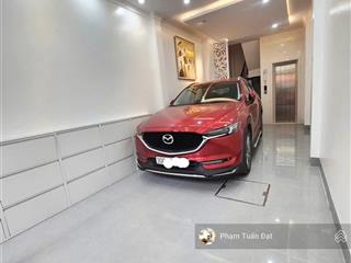 Bán nhà vĩnh hưng lô góc 5 tầng thiết kế hiện đại, gara ô tô, ngõ thông kinh doanh, 40m2 hơn 11 tỷ
