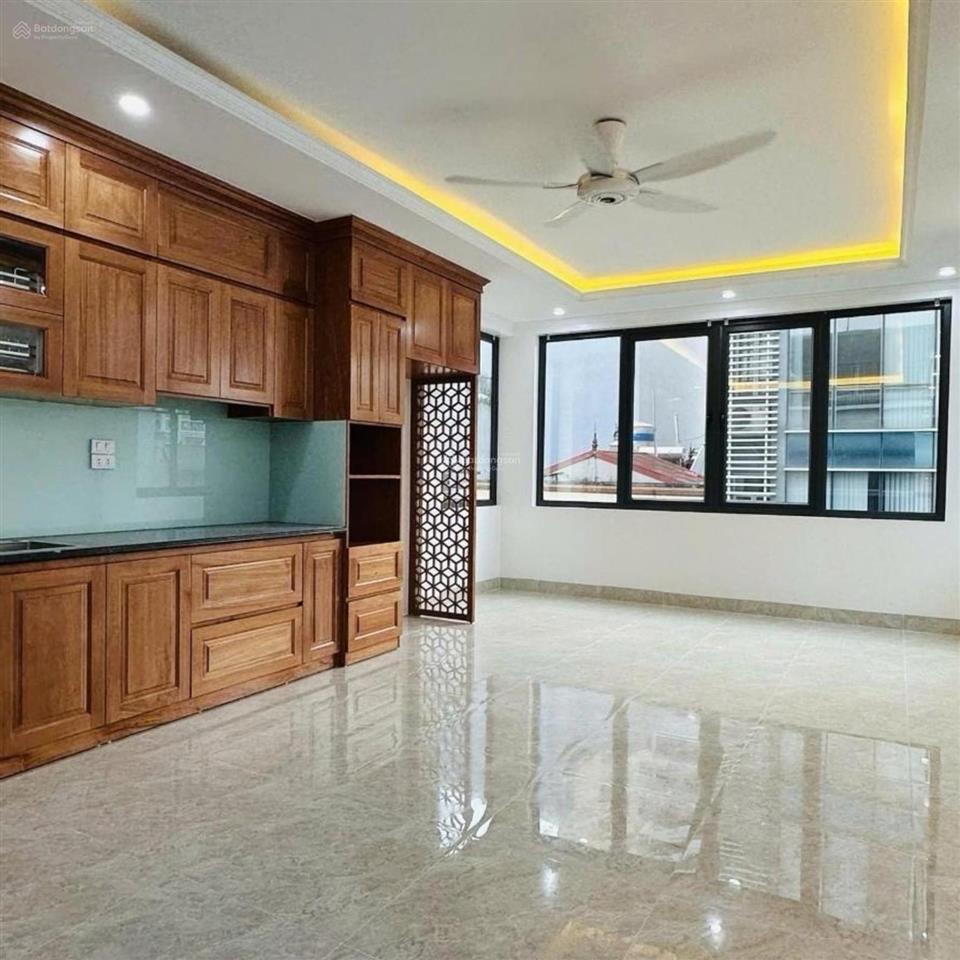 Bán tòa nhà 7 tầng thang máy dương khuê 58m ô tô tránh 34 tỷ