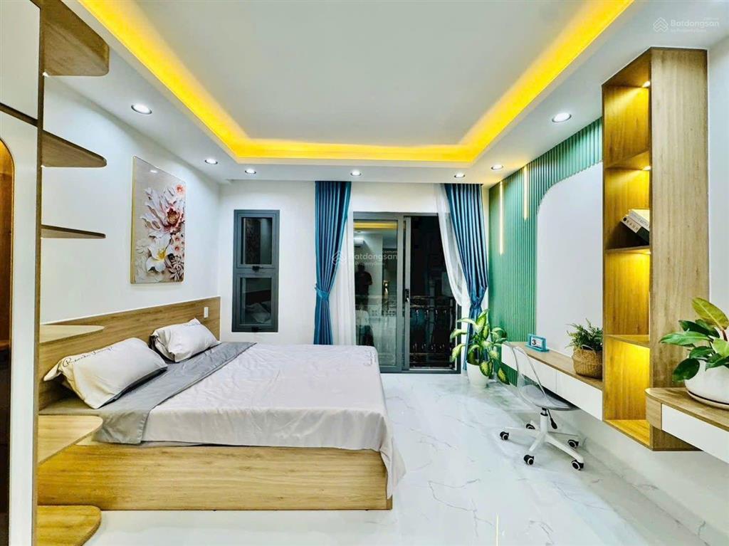 Bán nhà 55m2 ngay chợ gò vấp phường 4 sau lưng hẻm xe tải thông ngang 5,2m nở hậu  xây mới đẹp