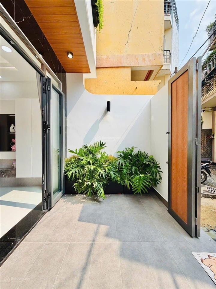 Bán nhà xây mới nguyễn kiệm 4 x11m  đối diện bệnh viện 175 ngay sân bay tân sơn nhất ra hxh 20m