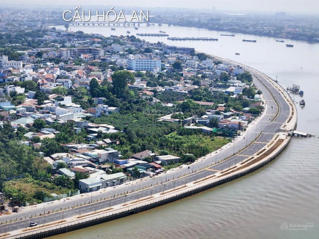 Bán lô đất (góc 2 mặt tiền). dt 280m2 thổ cư 100% đường 40m + vỉa hè 5m view sông bờ kè bửu long