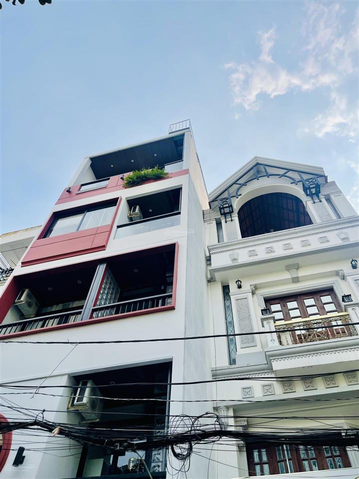 Bán toà nhà 5 tầng 16 phòng có thang máy hồng hà tân bình  100m2 (5x20)  thu nhập 150 triệu/tháng