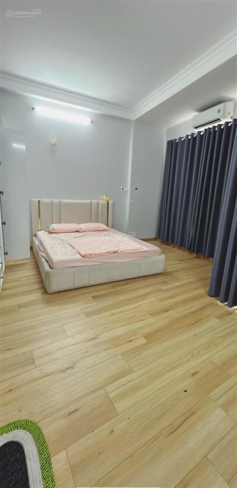 Mtkdđuờng số p4q4 xe hơi đậu cửa 4 tầng 4pn có thể khai thác thêm phòng làm căn hộ dịch vụ