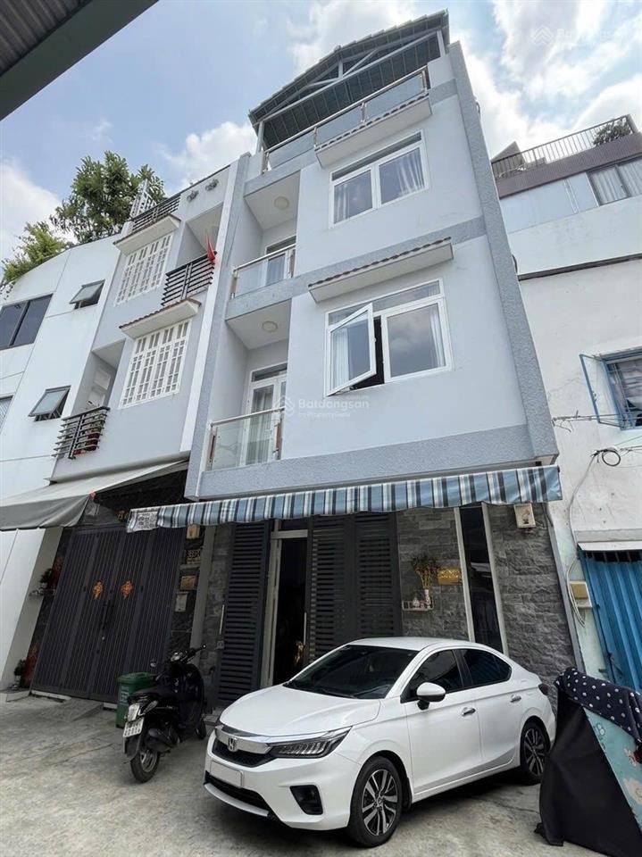 Mtkdđuờng số p4q4 xe hơi đậu cửa 4 tầng 4pn có thể khai thác thêm phòng làm căn hộ dịch vụ
