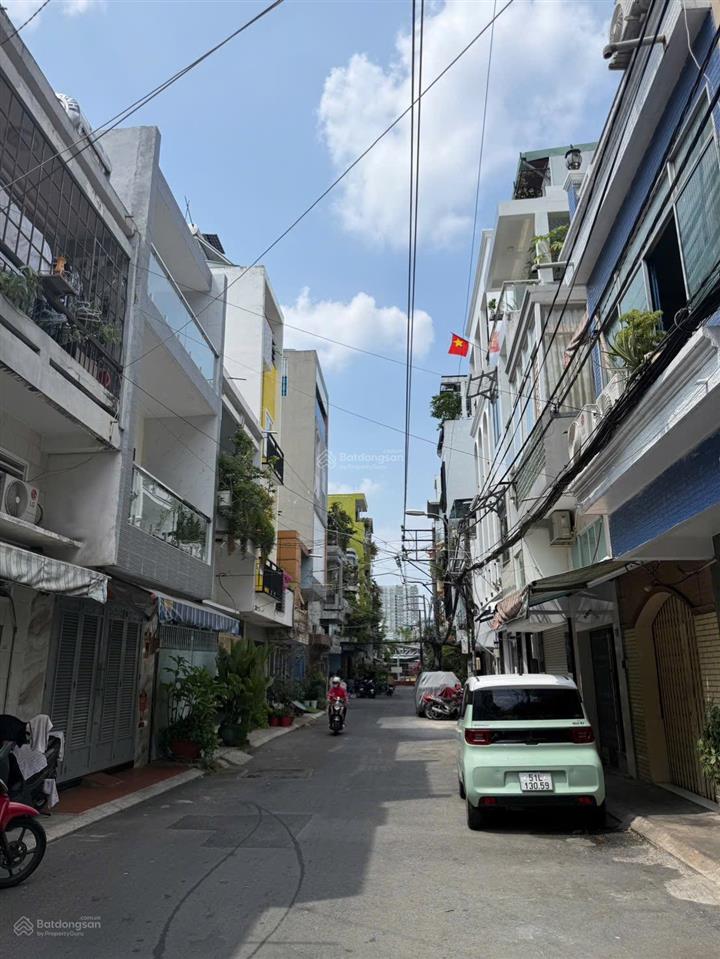 Mtkdđuờng số p4q4 xe hơi đậu cửa 4 tầng 4pn có thể khai thác thêm phòng làm căn hộ dịch vụ