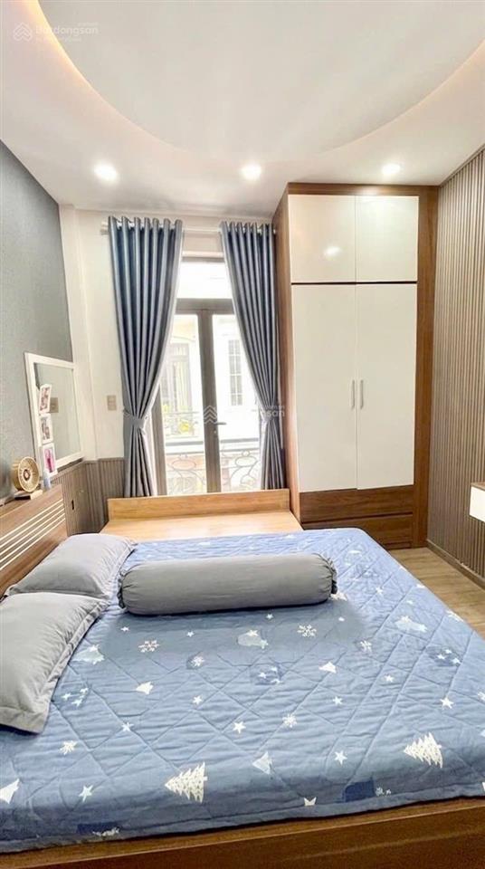 Hoàng diệu q4 5tỷ7  hẻm thông ô tô đỗ cửa 5 tầng kinh doanh tốt