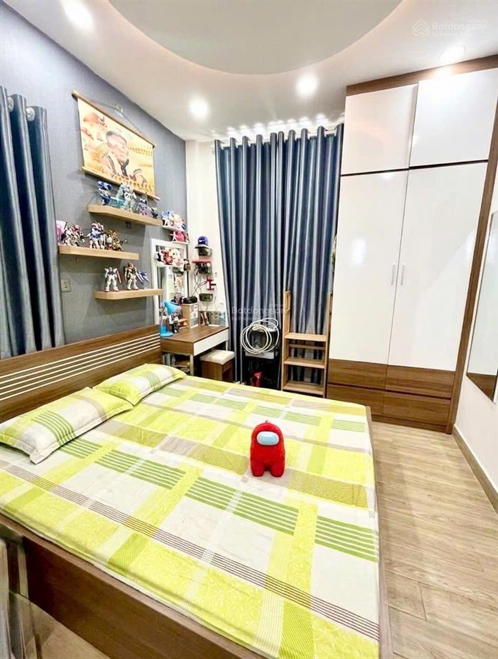 Hoàng diệu q4 5tỷ7  hẻm thông ô tô đỗ cửa 5 tầng kinh doanh tốt