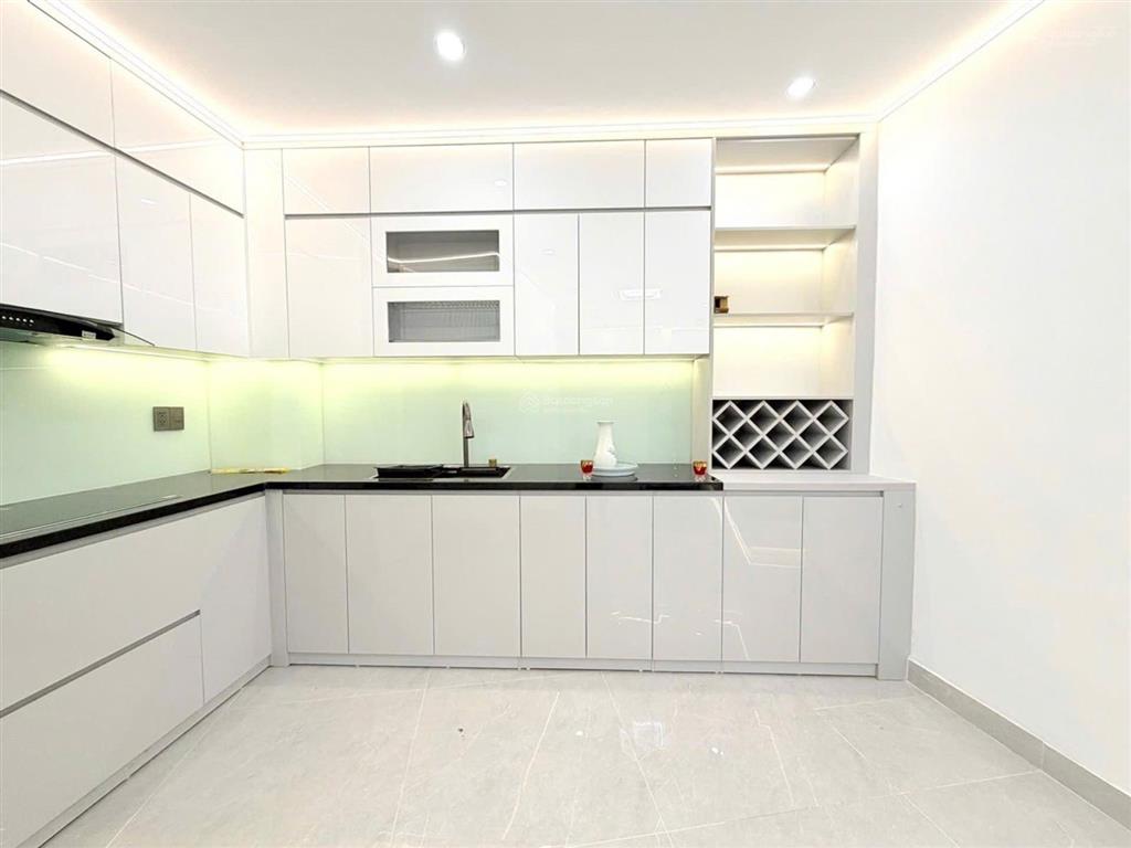 Hơn 12 tỷ  hoàng văn thái  55m  5 tầng thang máy  ô tô đỗ cổng, nhà đẹp, hiện đại, sổ đỏ nở hậu