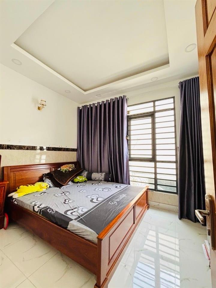 Nhà đẹp 4 tầng  hẻm oto gần mặt tiền ngay góc lê quang định  nguyễn văn đậu