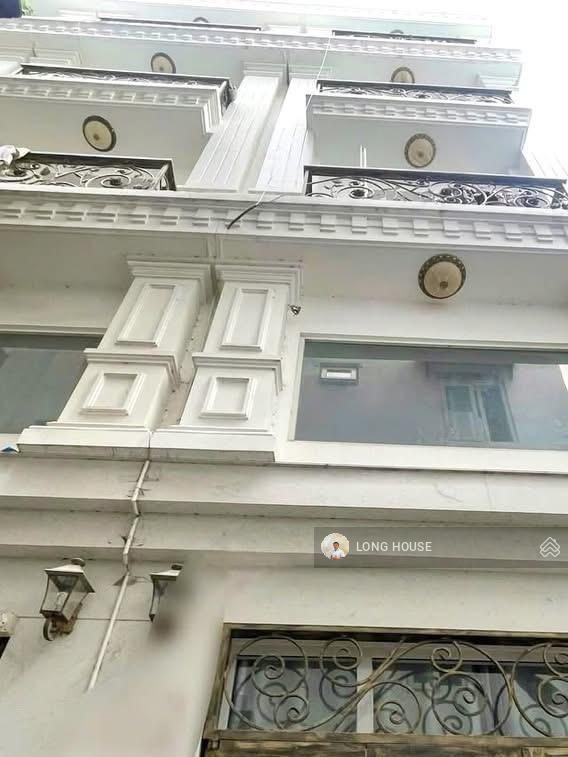 Nhà đẹp 4 tầng  hẻm oto gần mặt tiền ngay góc lê quang định  nguyễn văn đậu